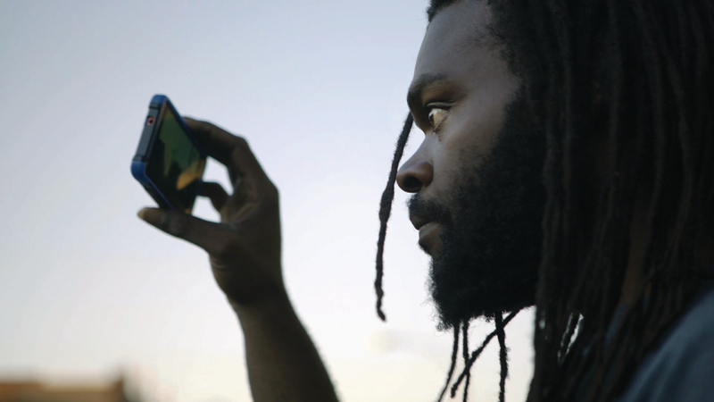Kevin Moore films police activity in the film Copwatch. (Adriel Gonzalez)
